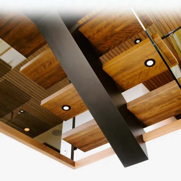 New York floating stairs showcase structural elegance with a bold central steel spine.
