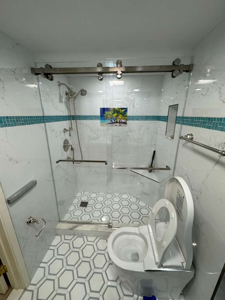 High-quality glass shower enclosure with modern fixtures. Perfect for elegant bathroom upgrades.