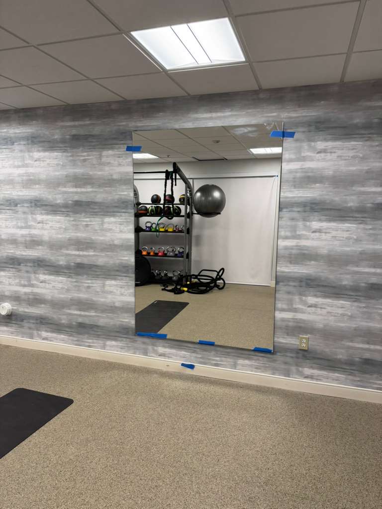 High-quality glass mirror for gym or fitness studio.