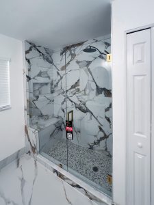 High-end marble shower glass enclosure with durable frameless design.
