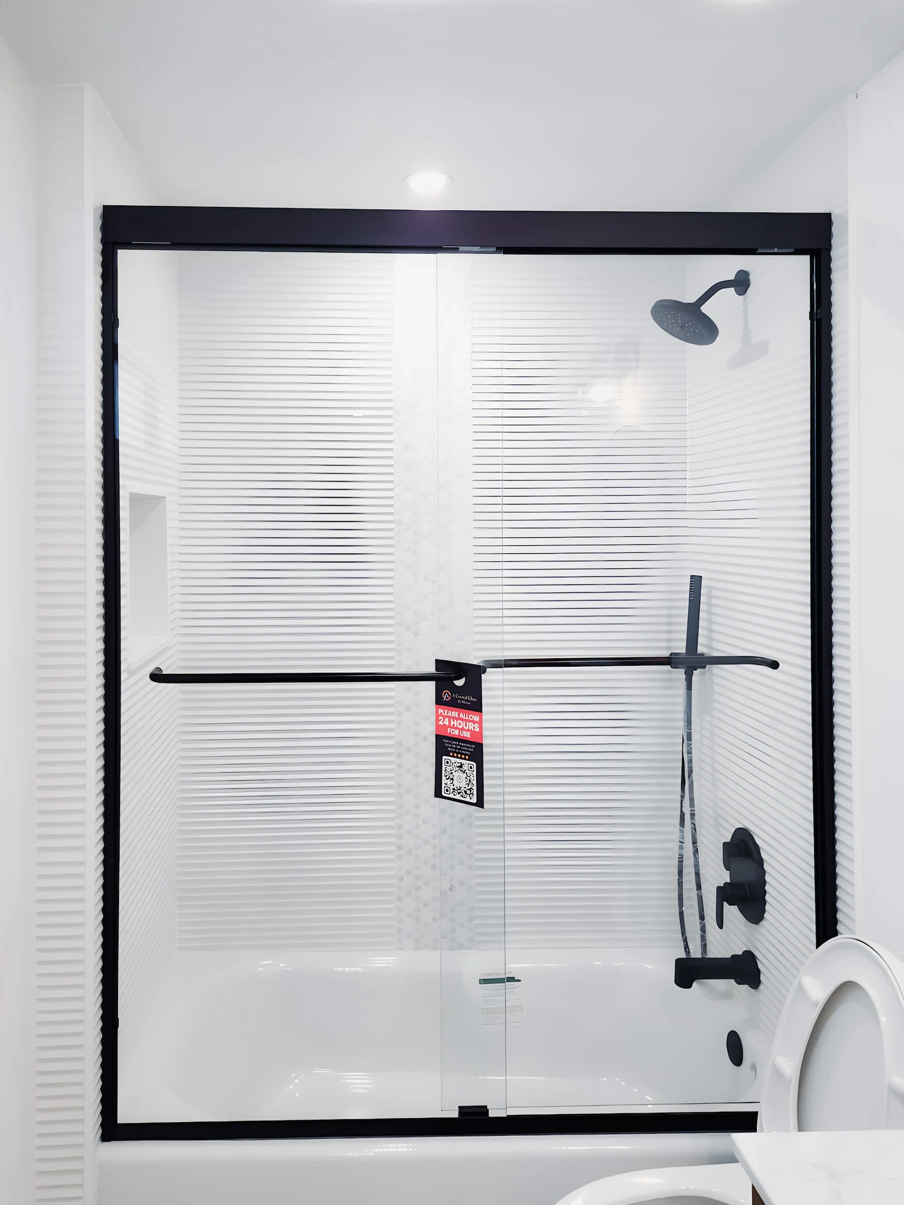 High-quality glass shower enclosure for modern bathrooms. Custom mirrors and glass solutions by A Crystal Glass.