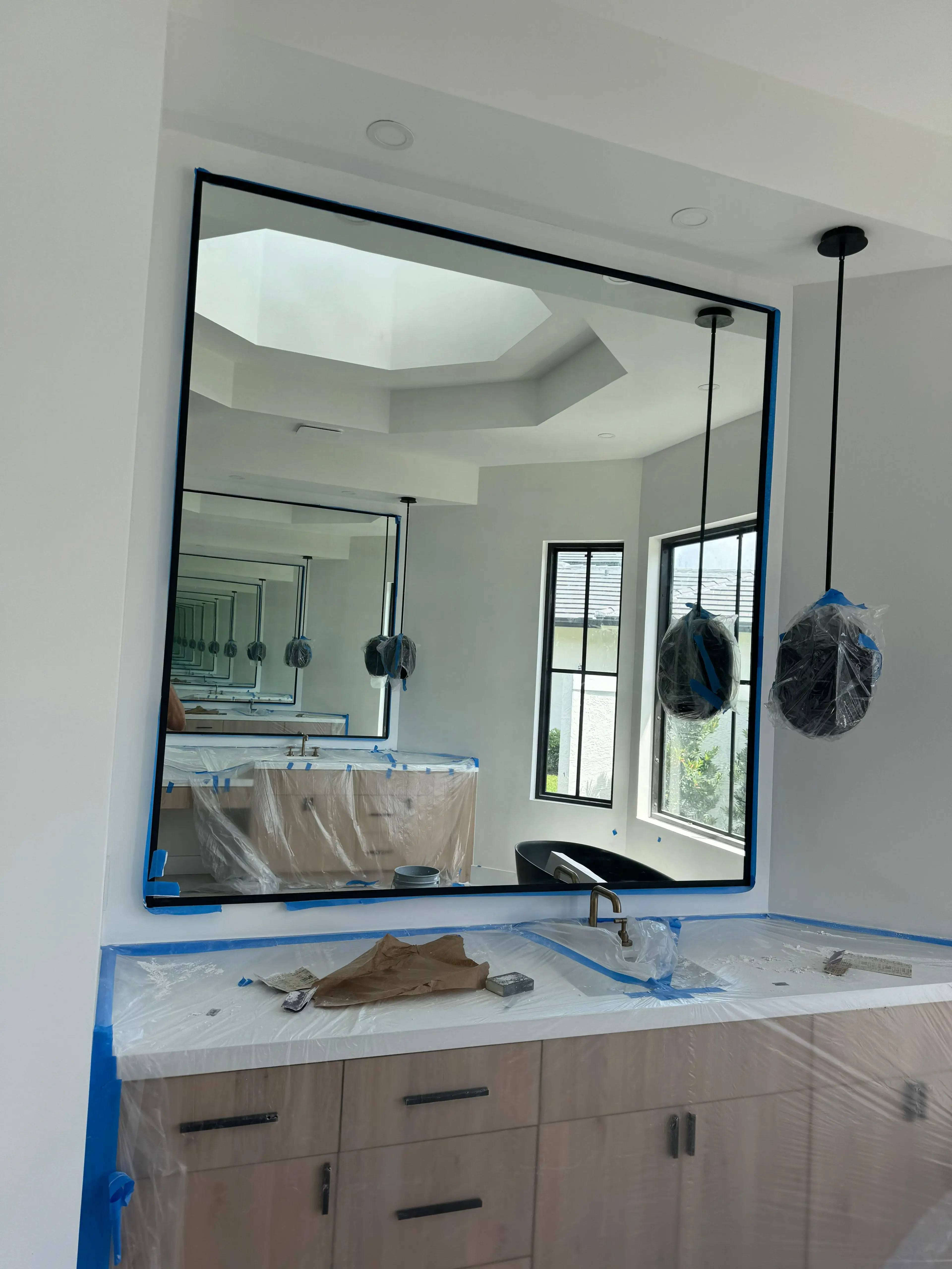 High-quality custom glass and mirror installation in modern homes. Elegant and durable mirror designs by A Crystal Glass & Mirror.