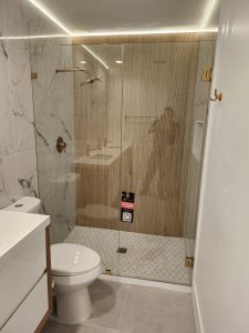 Luxury glass shower enclosure with modern design.