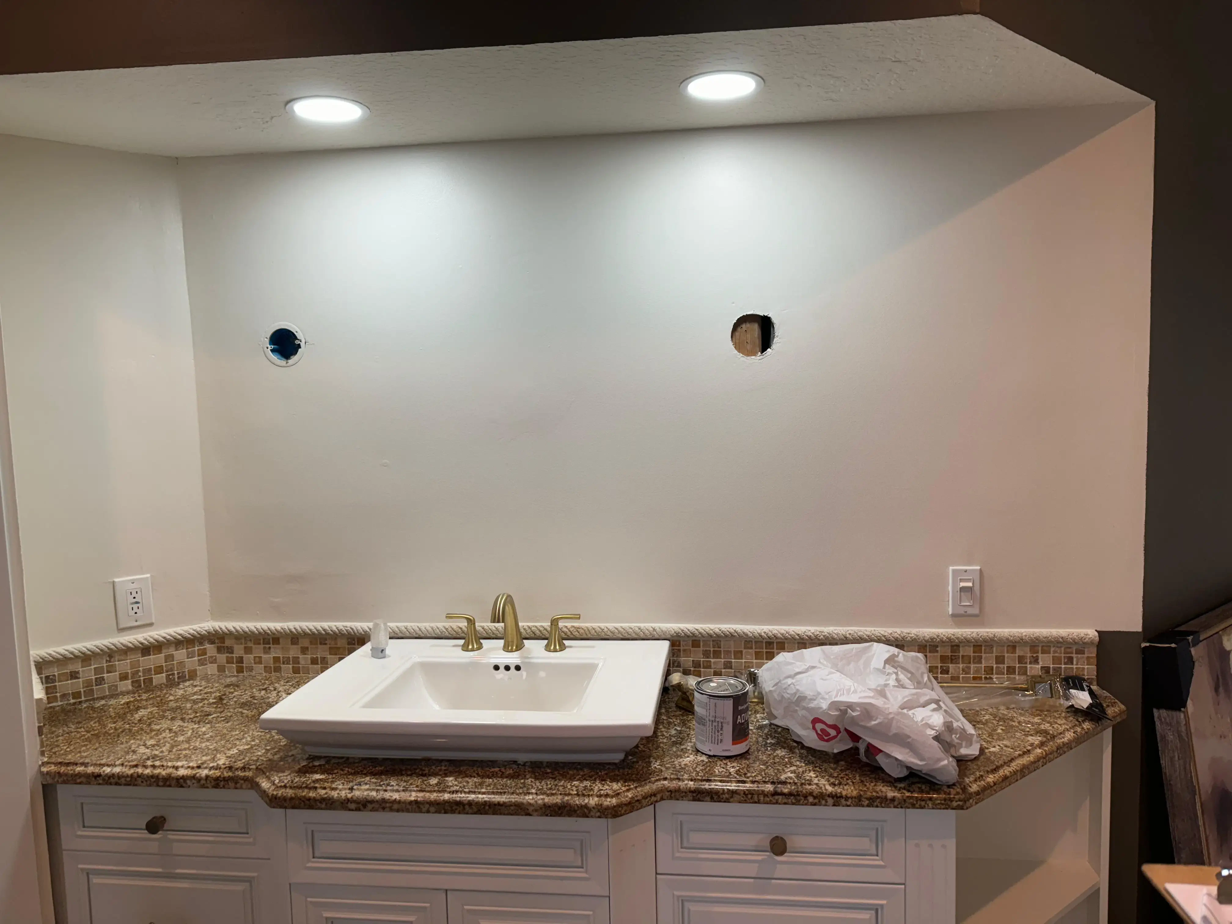 High-quality custom mirror and glass work for bathroom renovation.