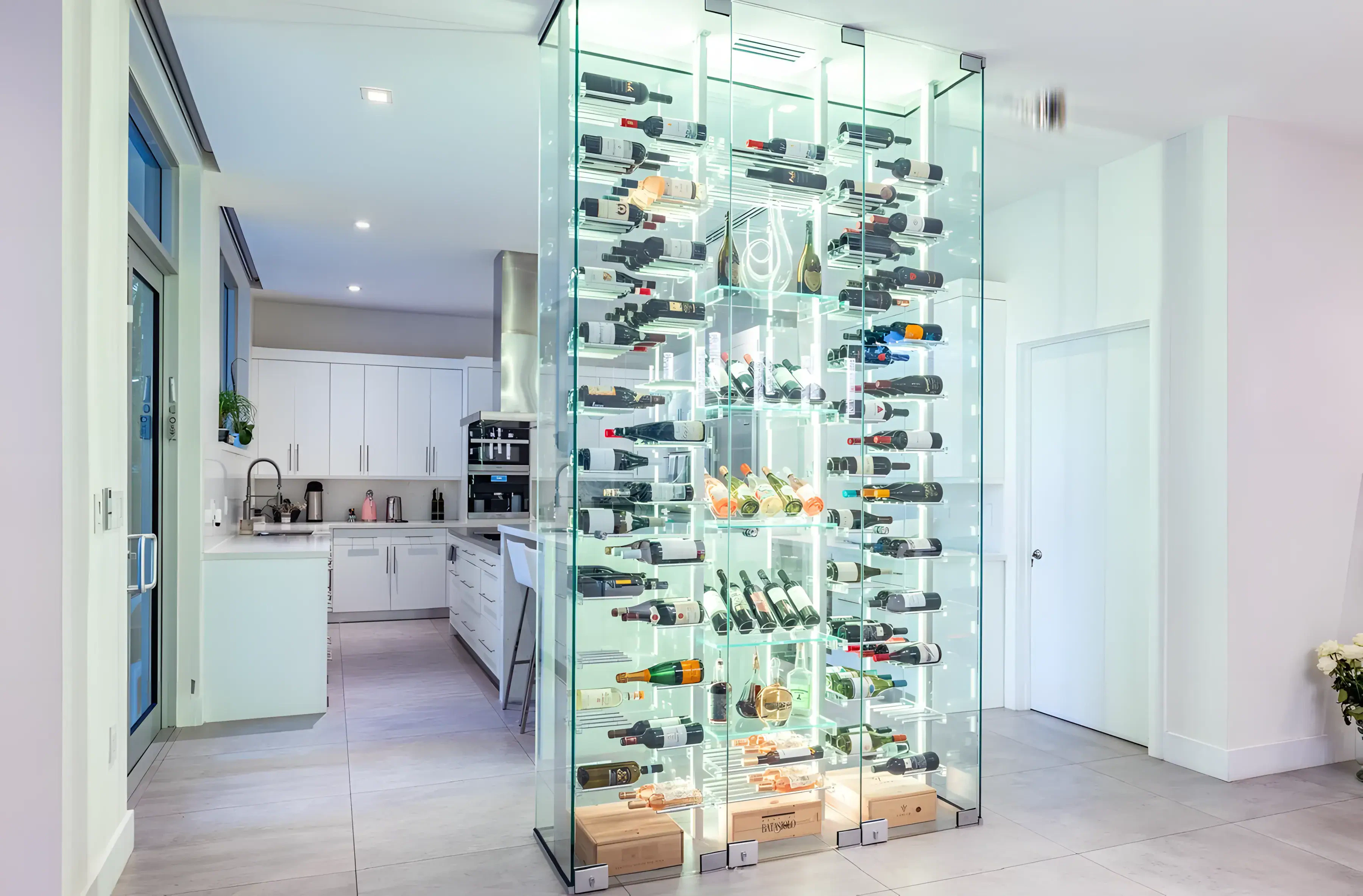 Stunning glass wine cabinet with LED lighting for storing and showcasing wine bottles elegantly.