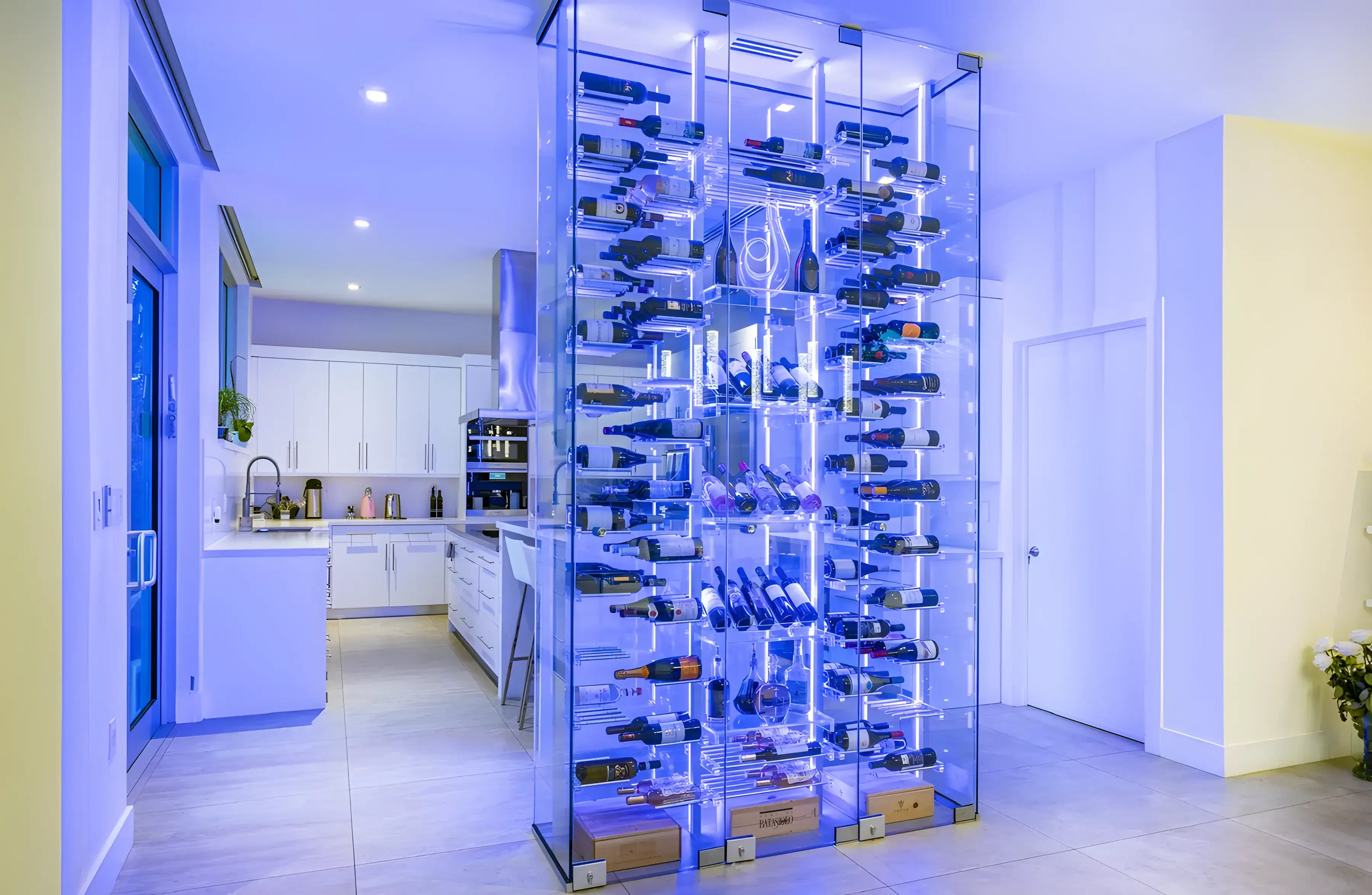 Celebrating modern glass and mirror design with illuminated wine racks.