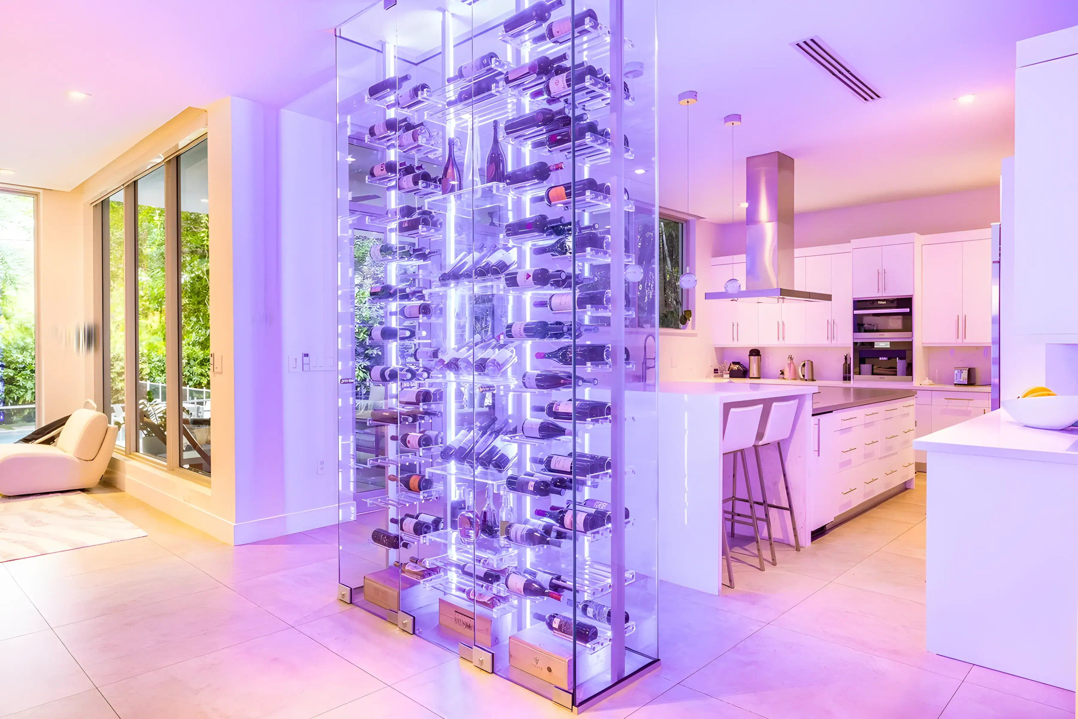 Luxurious wine storage in a sleek, glass and mirror wine cabinet within contemporary kitchen design.