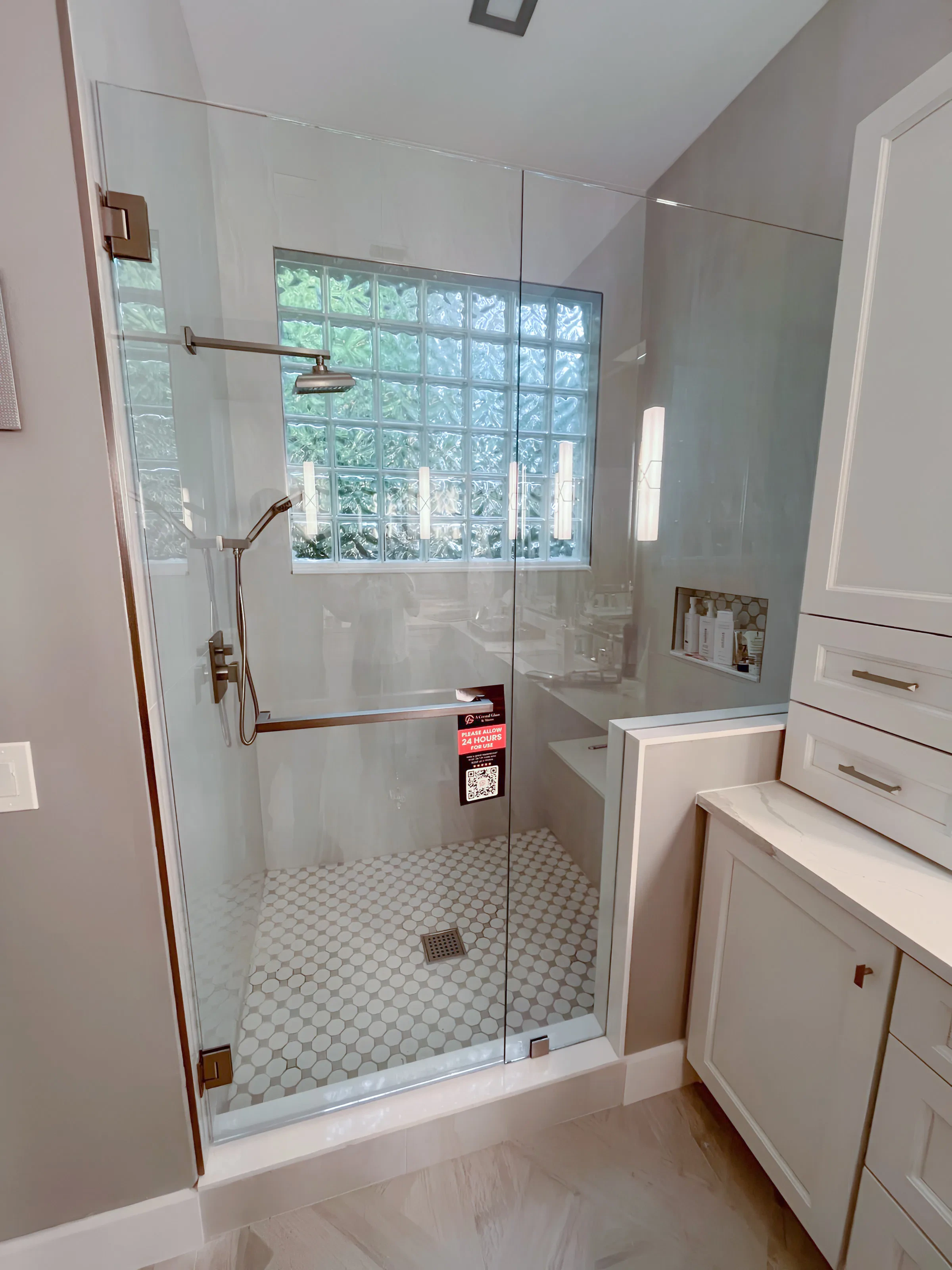 High-quality clear glass shower door with modern hardware for luxury bathrooms.