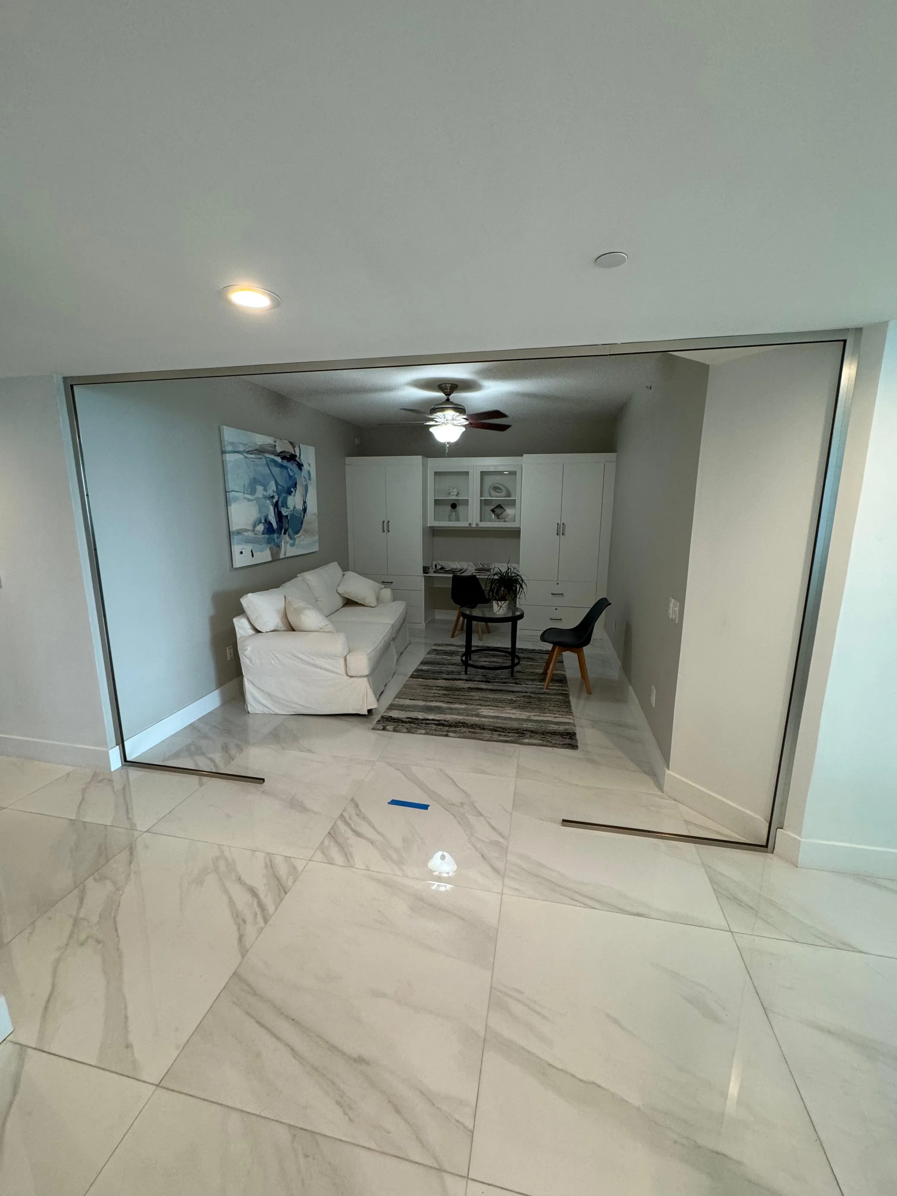 High-quality glass mirror sliding doors for elegant room division. Customizable and stylish.