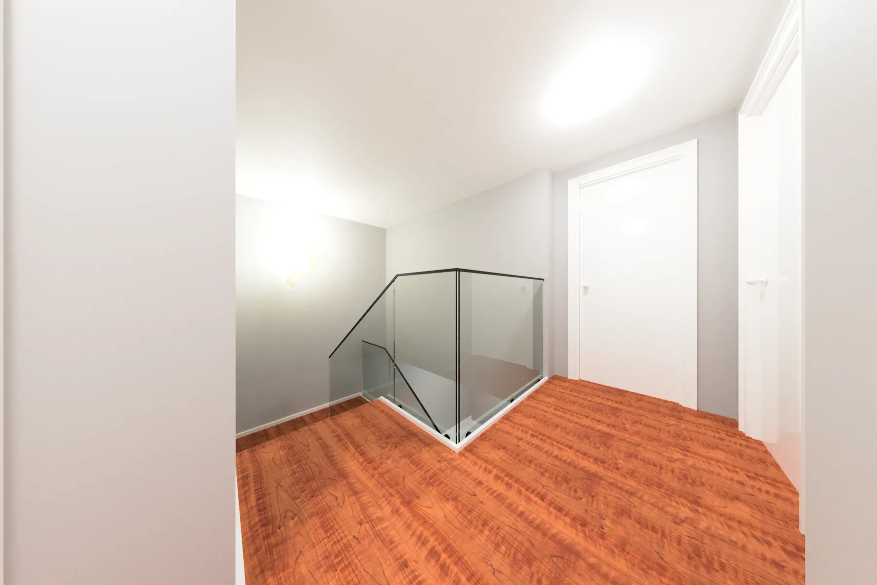 Bright modern glass and mirror installation in a contemporary home interior.