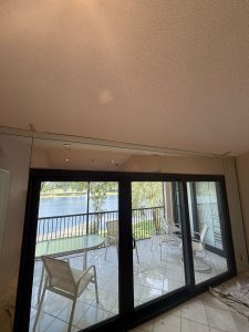 High-quality sliding glass door with reflective surface, elegant and durable.