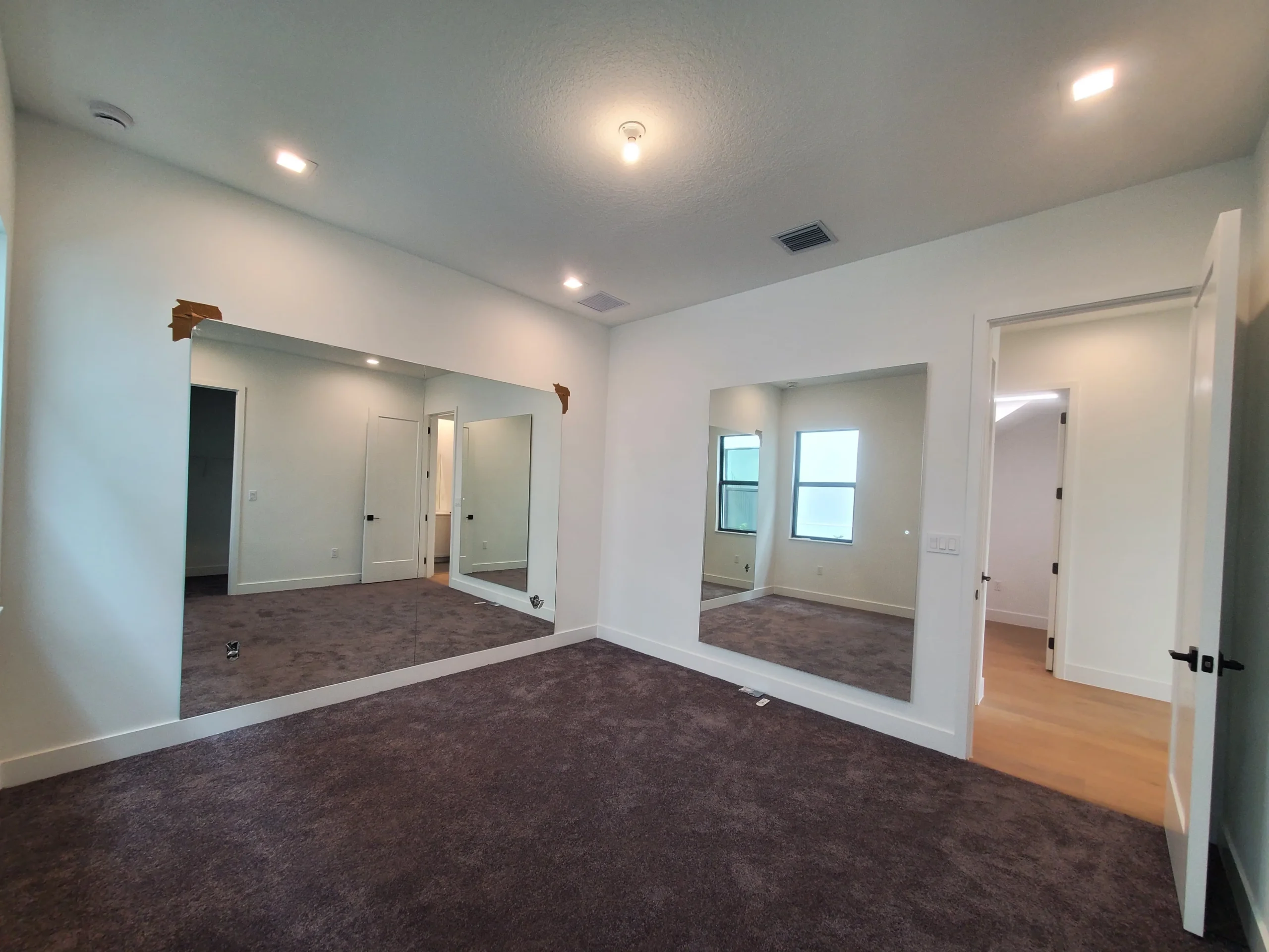 Shower Doors and Mirrors |  Feathering Way Residence