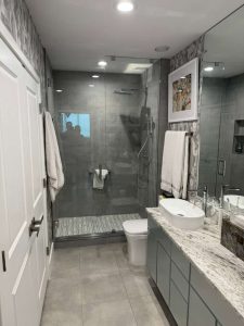 Elegant glass shower enclosure with modern design.