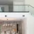High-quality glass staircase railing with sleek black accents in contemporary home design.
