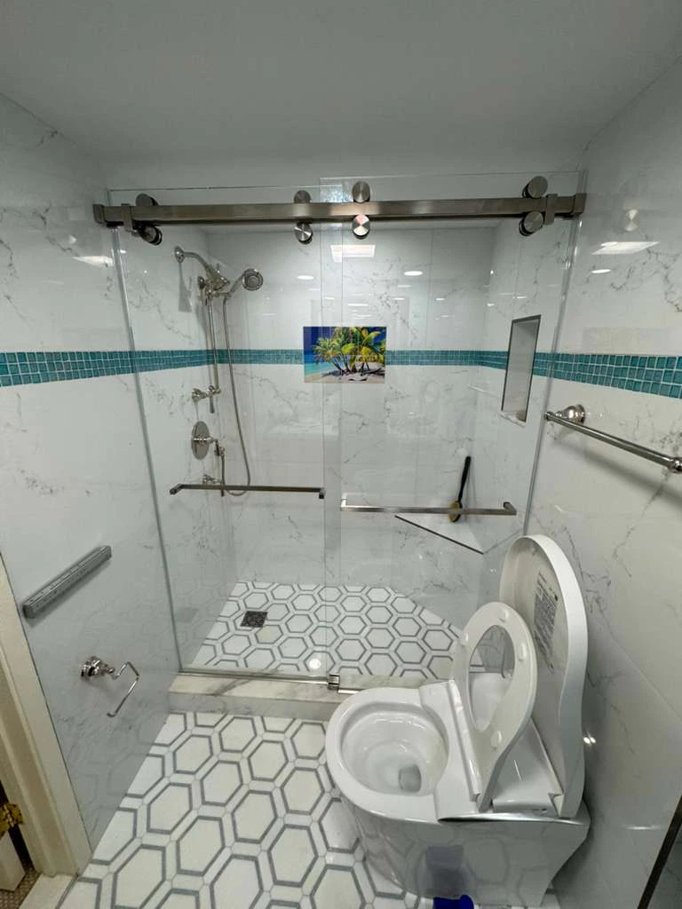 High-quality glass shower enclosure with modern fixtures. Perfect for elegant bathroom upgrades.