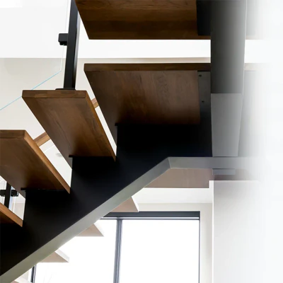 The Paris floating stairs redefine versatility with their central steel spine—a perfect balance of form and function.