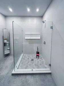 High-quality clear crystal glass shower door with modern minimalist design for bathrooms.