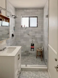 High-quality glass shower door with modern bathroom design.
