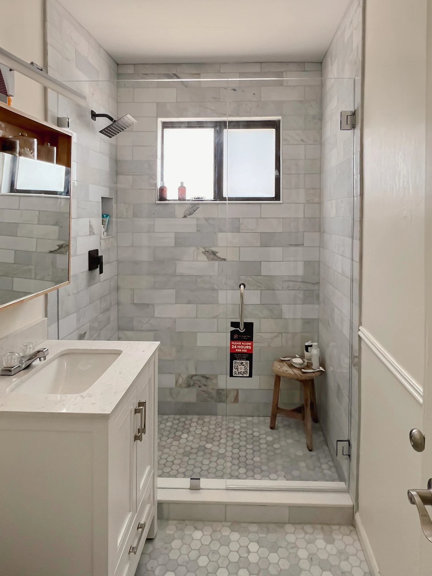 High-quality glass shower door with modern bathroom design.