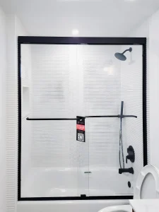 High-quality glass shower enclosure for modern bathrooms. Custom mirrors and glass solutions by ACG Glass & Metals.