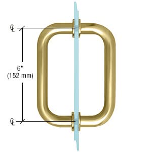 Elegant gold door handle with glass inset, made of high-quality crystal glass.