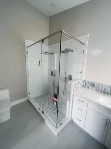 High-quality glass shower door with modern hardware, perfect for luxury bathroom upgrade.