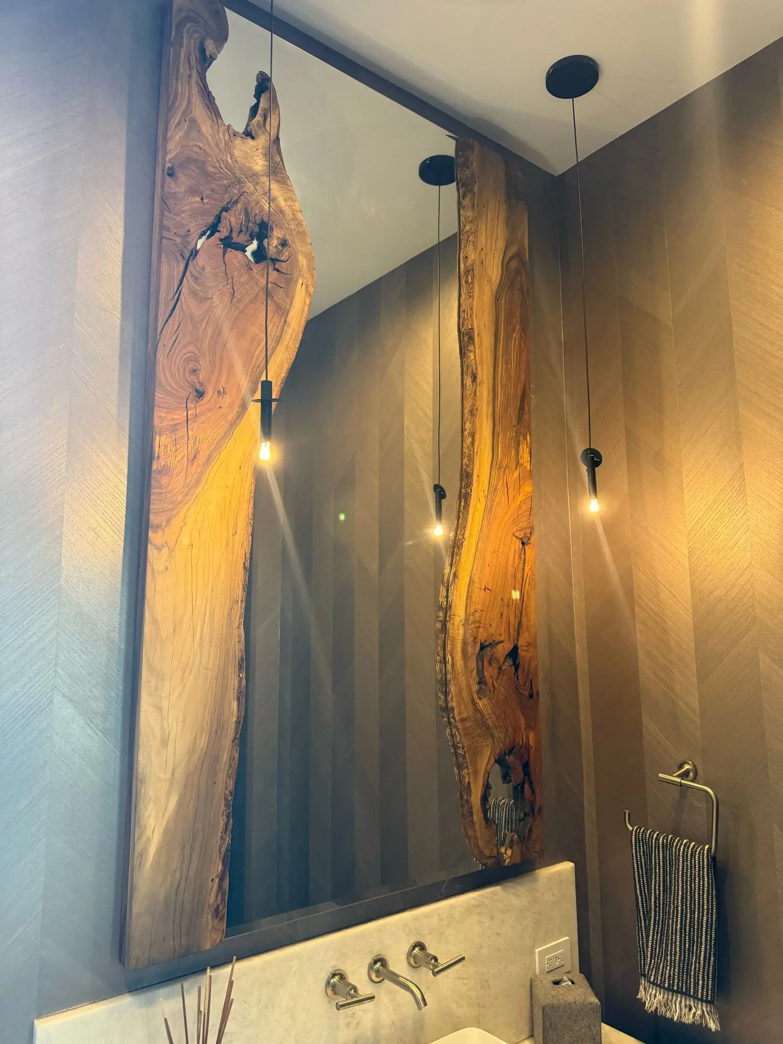 High-quality wooden wall mirror with integrated lighting, perfect for contemporary home decor.