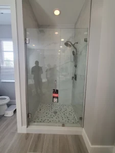 High-quality glass shower door with sleek hardware.