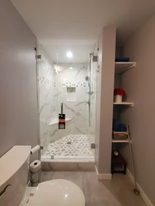 Meticulous mirror and glass shower.