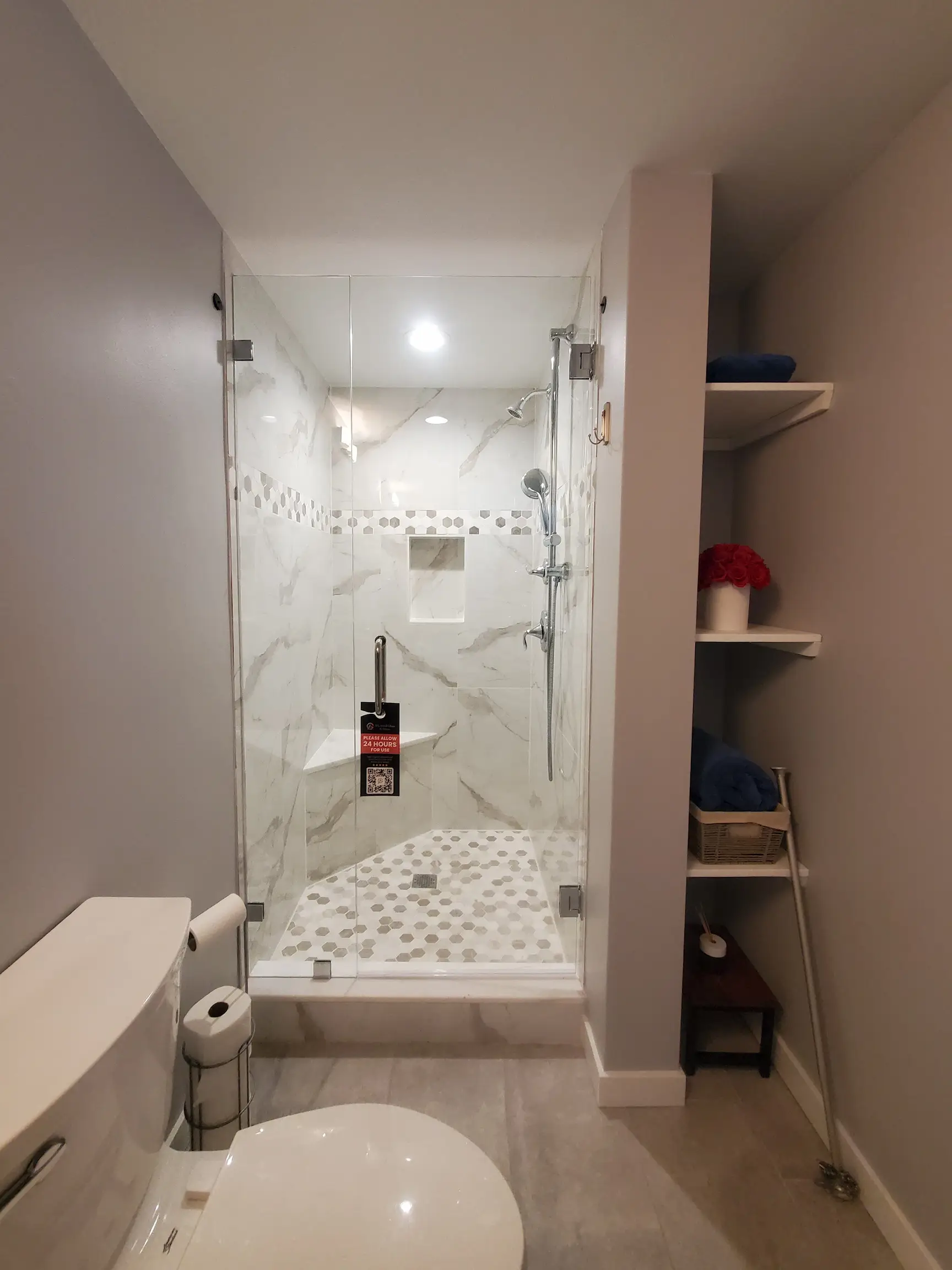 Meticulous mirror and glass shower.