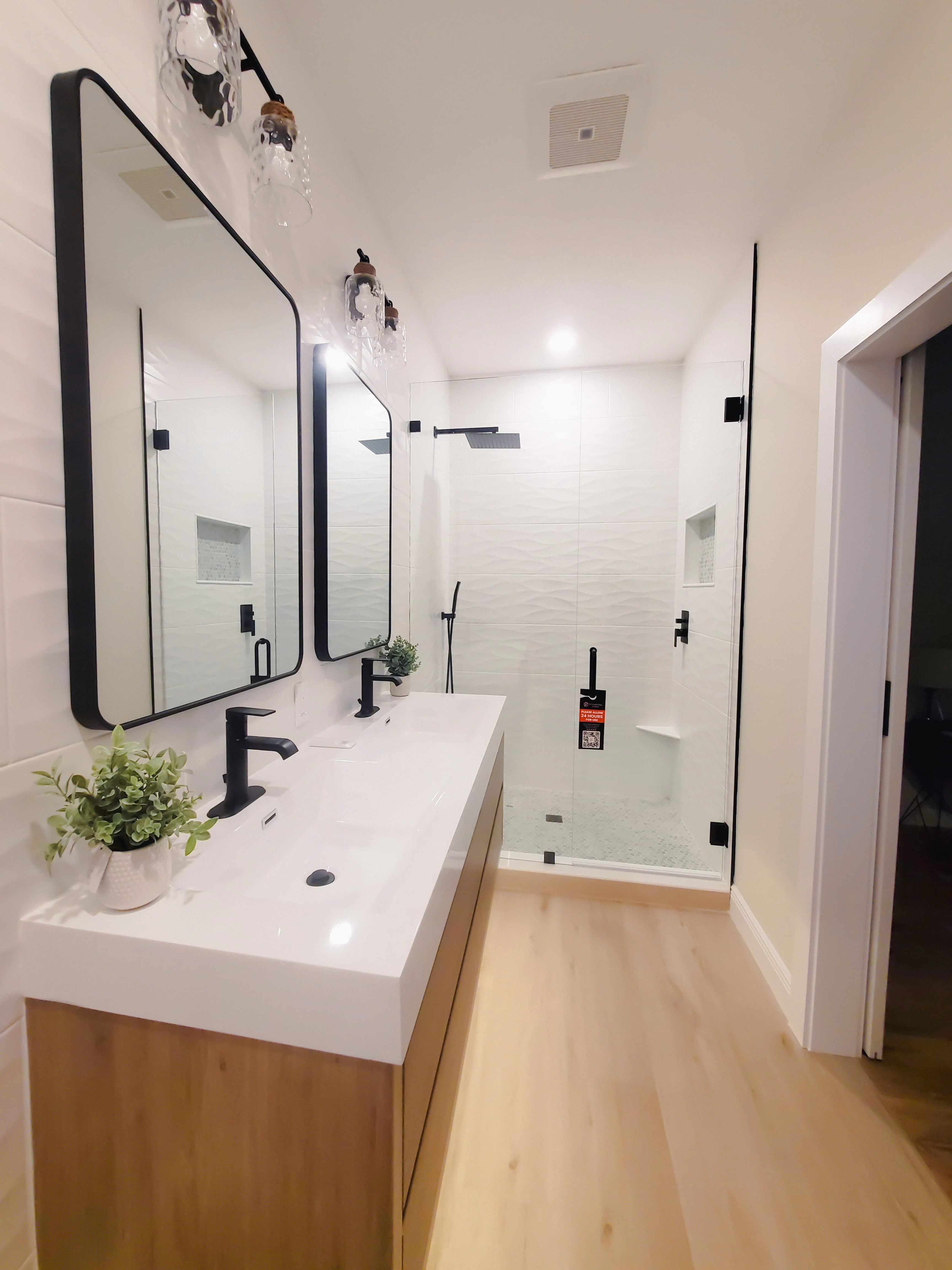 High-quality glass and mirror installation for elegant bathroom decor.