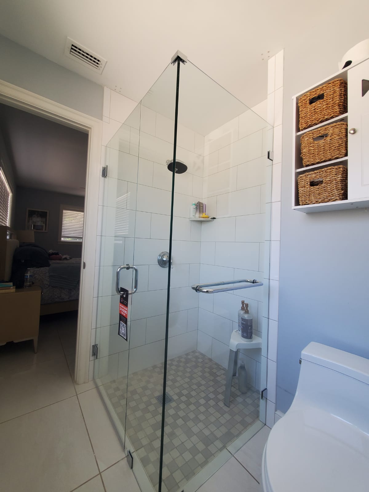 High-quality clear glass shower door with sleek hardware, ideal for bathroom renovation and home improvement.