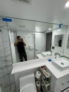 High-quality glass mirror for bathroom, modern and stylish design.