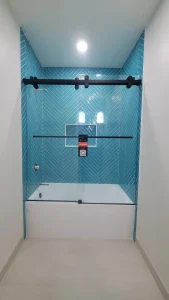 High-quality custom glass shower door for modern bathrooms and spas.