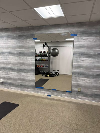 High-quality glass mirror for gym or fitness studio.